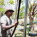 Sailors and Soldiers construct temporary shelters for Saipan residents affected by Super Typhoon Sinlaku