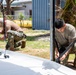 Sailors and Soldiers construct temporary shelters for Saipan residents affected by Super Typhoon Sinlaku