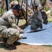 Sailors and Soldiers construct temporary shelters for Saipan residents affected by Super Typhoon Sinlaku
