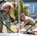 Sailors and Soldiers construct temporary shelters for Saipan residents affected by Super Typhoon Sinlaku