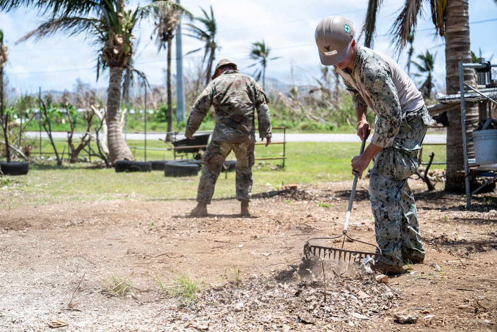 Sailors and Soldiers construct temporary shelters for Saipan residents affected by Super Typhoon Sinlaku