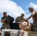Sailors and Soldiers construct temporary shelters for Saipan residents affected by Super Typhoon Sinlaku