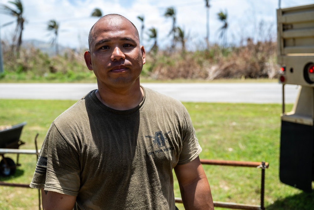 Sailors and Soldiers deliver emergency supplies for Saipan residents affected by Super Typhoon Sinlaku