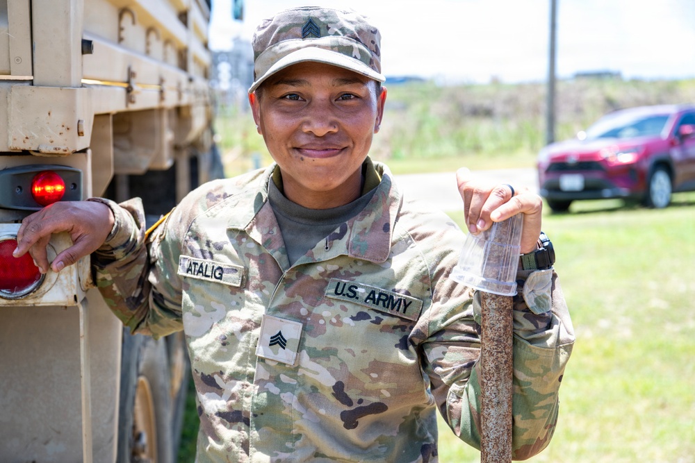 Sailors and Soldiers deliver emergency supplies for Saipan residents affected by Super Typhoon Sinlaku