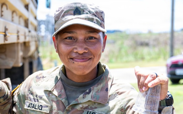 Sailors and Soldiers deliver emergency supplies for Saipan residents affected by Super Typhoon Sinlaku