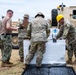 Sailors and Soldiers deliver emergency supplies for Saipan residents affected by Super Typhoon Sinlaku