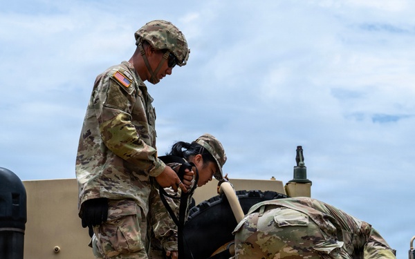 Sailors and Soldiers deliver emergency supplies for Saipan residents affected by Super Typhoon Sinlaku