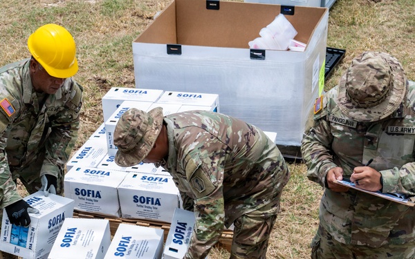 Sailors and Soldiers deliver emergency supplies for Saipan residents affected by Super Typhoon Sinlaku