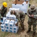 Sailors and Soldiers deliver emergency supplies for Saipan residents affected by Super Typhoon Sinlaku