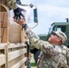 Sailors and Soldiers deliver emergency supplies for Saipan residents affected by Super Typhoon Sinlaku