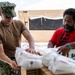 Sailors and Soldiers deliver emergency supplies for Saipan residents affected by Super Typhoon Sinlaku