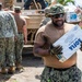 Sailors and Soldiers deliver emergency supplies for Saipan residents affected by Super Typhoon Sinlaku
