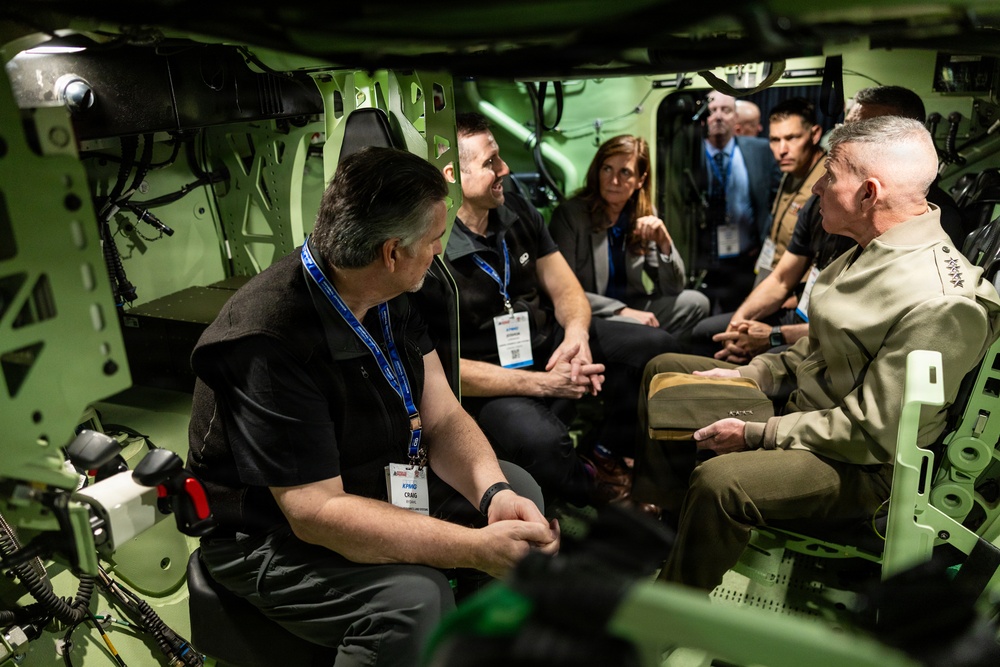 The Commandant, Gen. Eric M. Smith walks the Modern Day Marine Floor