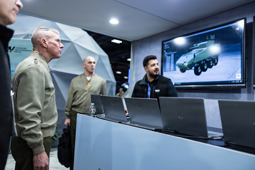 The Commandant, Gen. Eric M. Smith walks the Modern Day Marine Floor