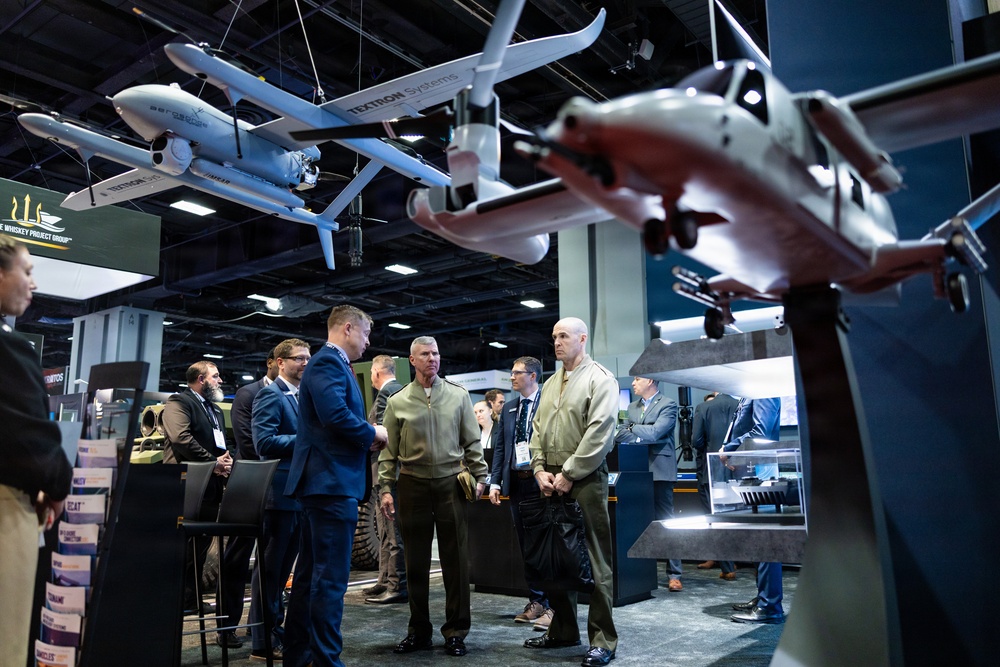 The Commandant, Gen. Eric M. Smith walks the Modern Day Marine Floor