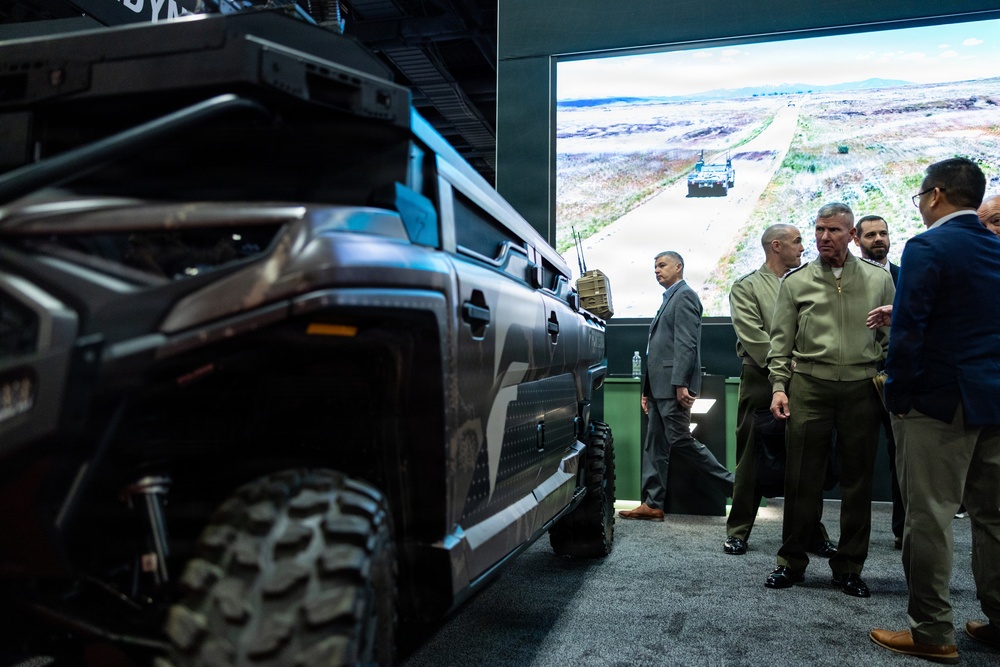 The Commandant, Gen. Eric M. Smith walks the Modern Day Marine Floor
