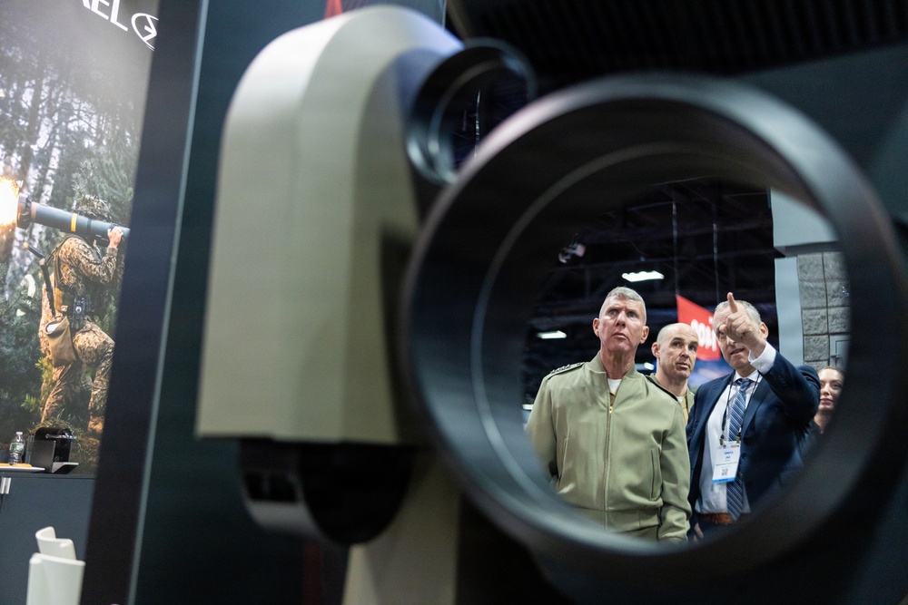 The Commandant, Gen. Eric M. Smith walks the Modern Day Marine Floor