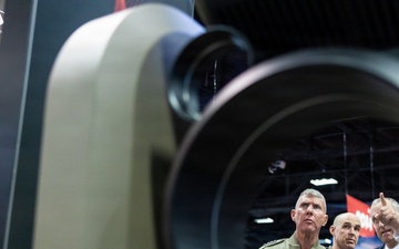 The Commandant, Gen. Eric M. Smith walks the Modern Day Marine Floor