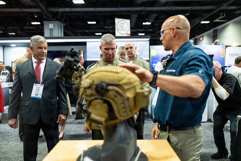 The Commandant, Gen. Eric M. Smith walks the Modern Day Marine Floor