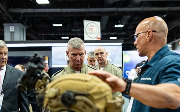 The Commandant, Gen. Eric M. Smith walks the Modern Day Marine Floor