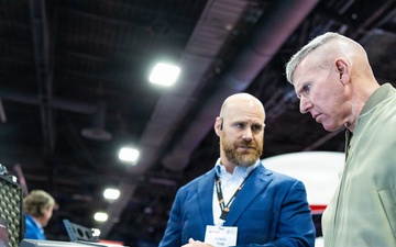 The Commandant, Gen. Eric M. Smith walks the Modern Day Marine Floor