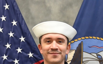 Official portrait of Interior Communications Electrician 1st Class Donald K. Bretz III