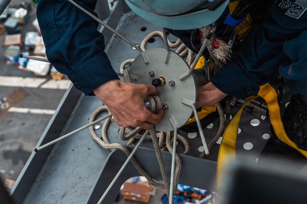 Ronald Reagan Sailors Install Antennas On The Mast