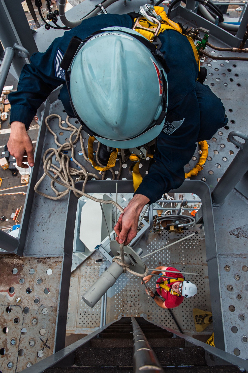 Ronald Reagan Sailors Install Antennas On The Mast