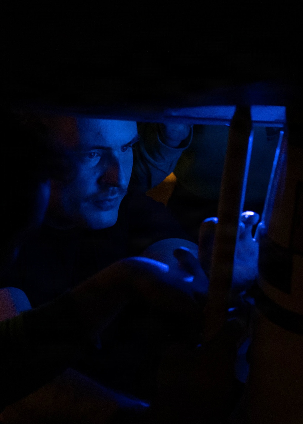 Nighttime Aircraft Maintenance Aboard USS George H.W. Bush (CVN 77)