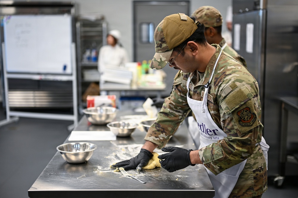 Delectable lessons: McConnell dabbles in the culinary arts