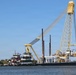 Heavy Lift Crane Barge and Tugboats Conduct Waterway Operations