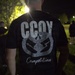 Soldier Wears CCOY Career Counselor Competition T-Shirt During Nighttime Event