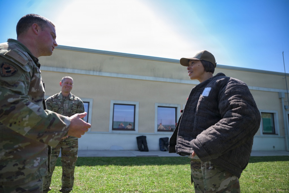 31 FW Command Chief immerses with 31 SFS K-9 unit