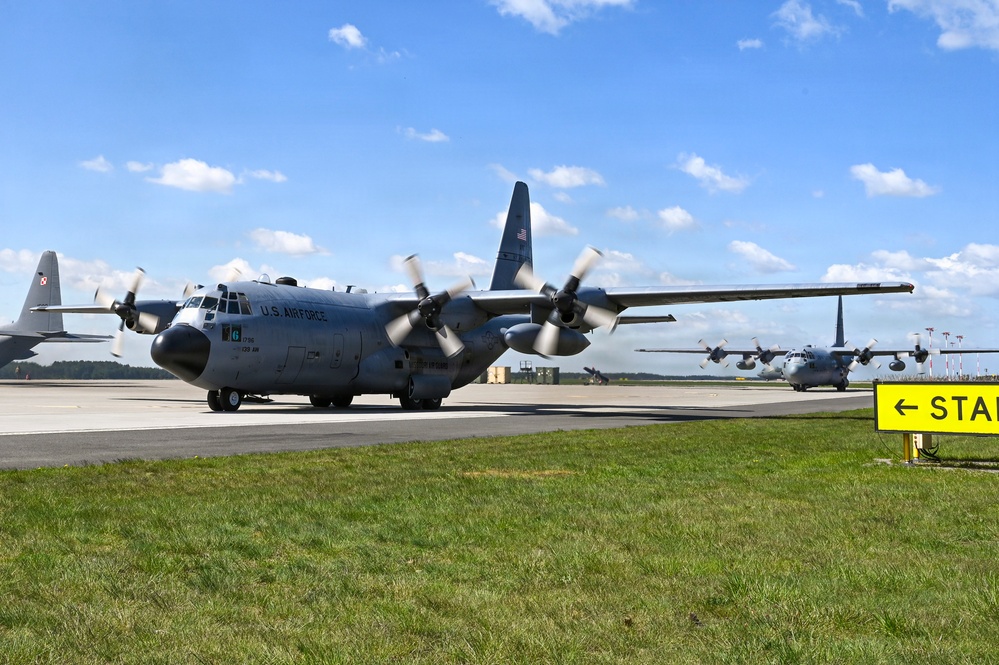 Headline: Supply from the sky: U.S., Polish Airmen strengthen Allied airlift capabilities during exercise Hussar Saber 26-1