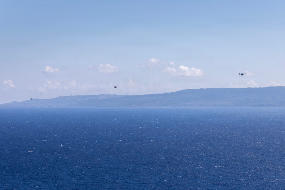Balikatan 2026: Task Force Saber conducts multiship AH-64 Apache reconnaissance flight over Luzon Strait during counter landing live-fire exercise