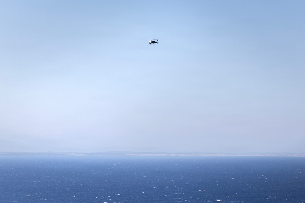 Balikatan 2026: Task Force Saber conducts multiship AH-64 Apache reconnaissance flight over Luzon Strait during counter landing live-fire exercise