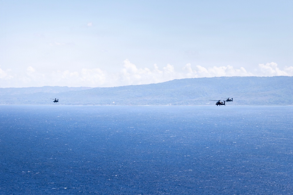 Balikatan 2026: Task Force Saber conducts multiship AH-64 Apache reconnaissance flight over Luzon Strait during counter landing live-fire exercise