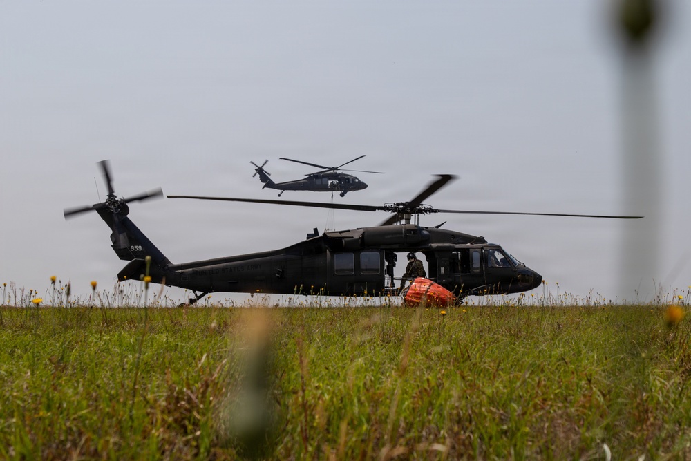 South Carolina Army National Guard helicopters practice aerial-firefighting training with the South Carolina Forestry Commission