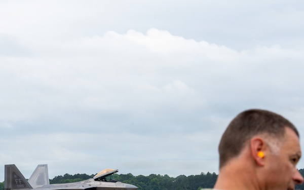 National Security Forum and Gathering of Eagles attendees observe Airpower demonstration at Maxwell Air Force Base