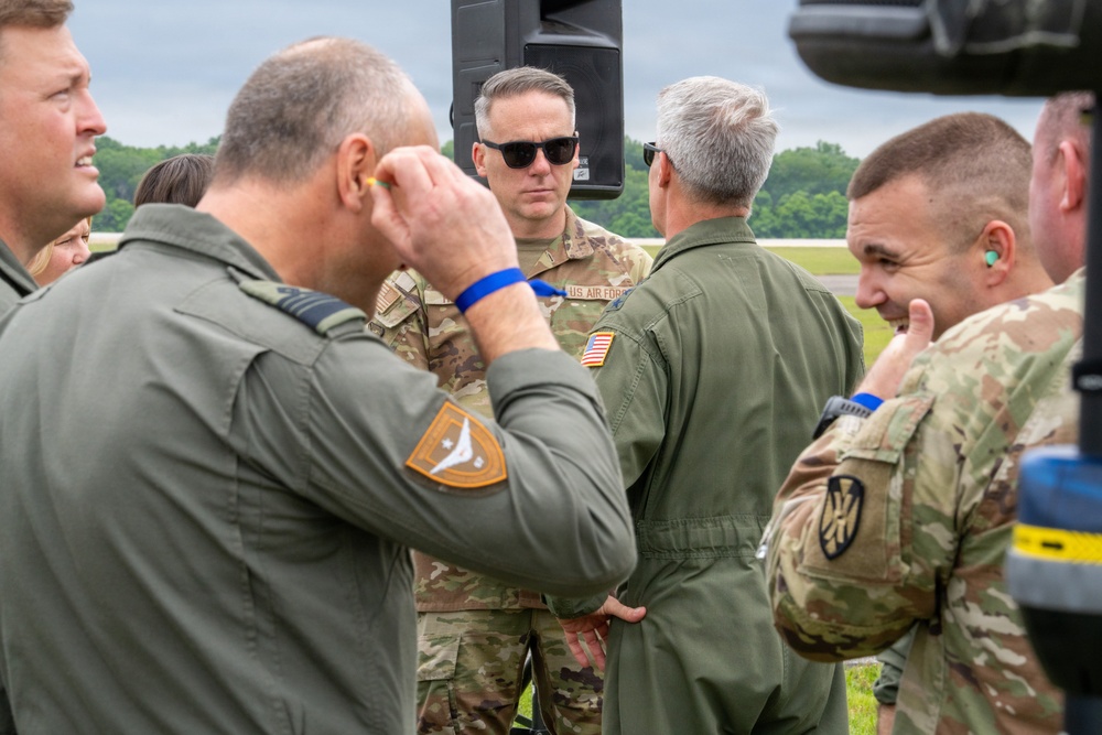 National Security Forum and Gathering of Eagles attendees observe Airpower demonstration at Maxwell Air Force Base