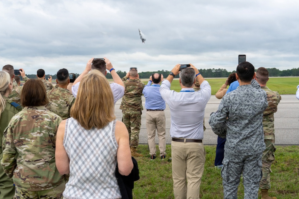 National Security Forum and Gathering of Eagles attendees observe Airpower demonstration at Maxwell Air Force Base