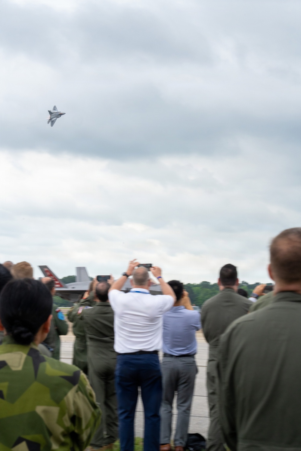 National Security Forum and Gathering of Eagles attendees observe Airpower demonstration at Maxwell Air Force Base