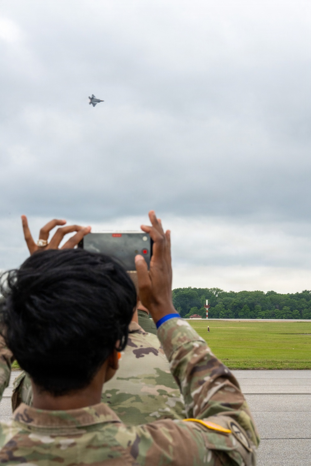 National Security Forum and Gathering of Eagles attendees observe Airpower demonstration at Maxwell Air Force Base