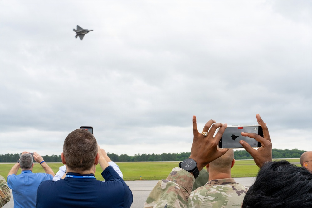 National Security Forum and Gathering of Eagles attendees observe Airpower demonstration at Maxwell Air Force Base