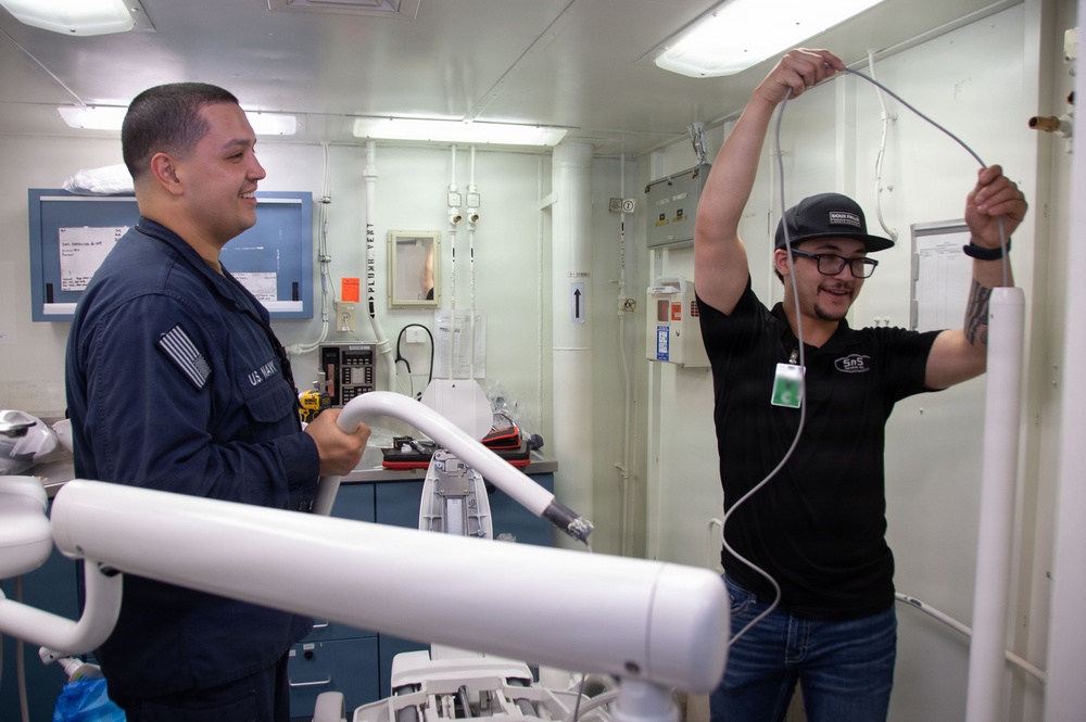 Ronald Reagan Sailors and Contractors Assemble Dental Equipment