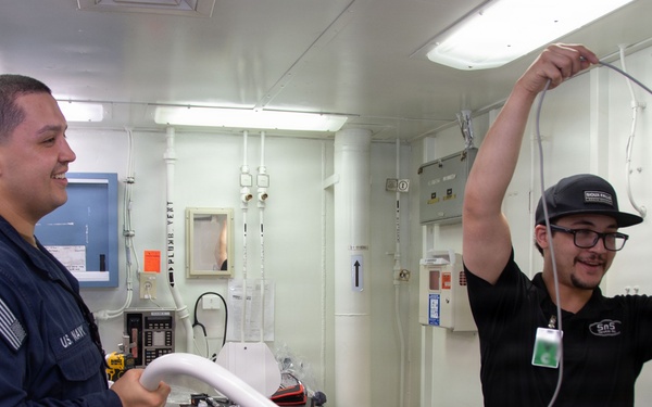 Ronald Reagan Sailors and Contractors Assemble Dental Equipment