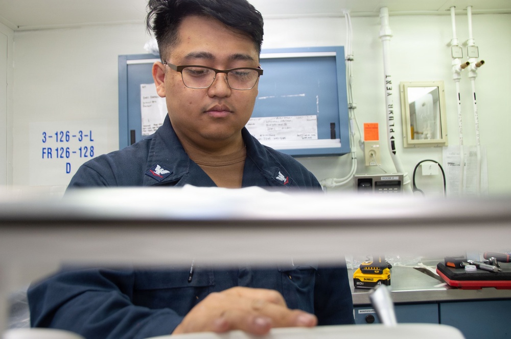 Ronald Reagan Sailors and Contractors Assemble Dental Equipment