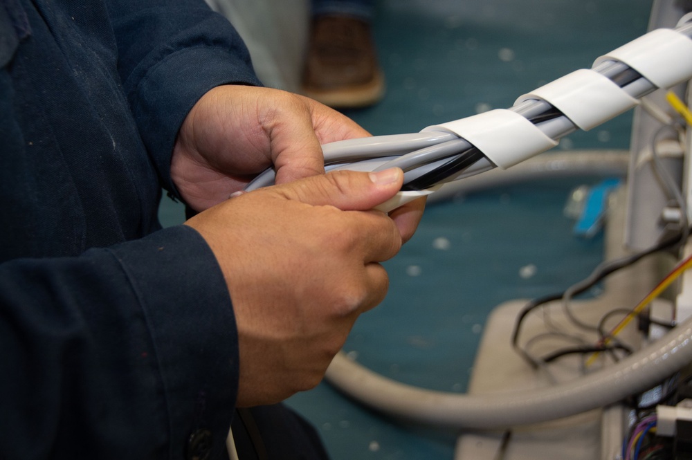 Ronald Reagan Sailors and Contractors Assemble Dental Equipment