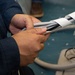 Ronald Reagan Sailors and Contractors Assemble Dental Equipment
