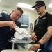 Ronald Reagan Sailors and Contractors Assemble Dental Equipment